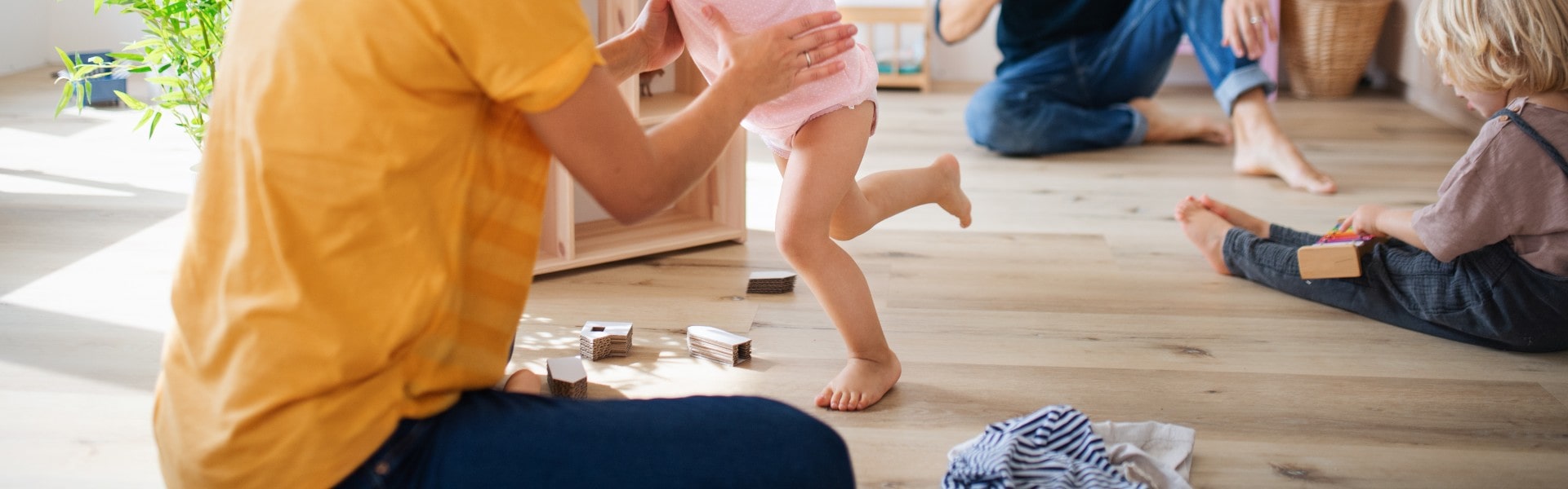 young-family-with-two-small-children-indoors