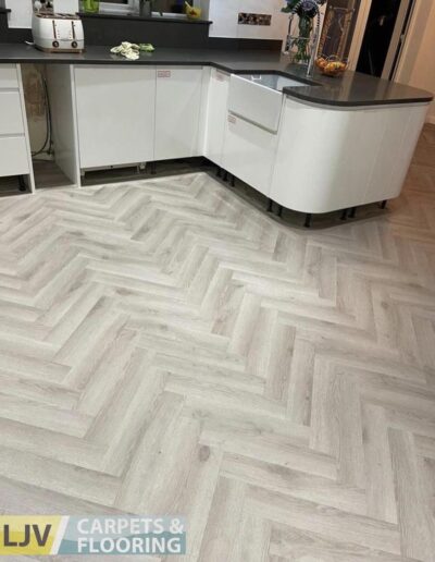 Laminate Flooring in modern kitchen - LJV Carpets & Flooring